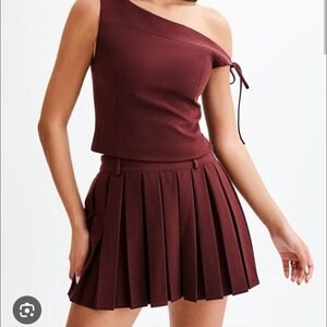 MESHKI Mura Pleated Mini Skirt (Plum) Medium